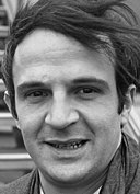 A close-up of a person

AI-generated content may be incorrect.